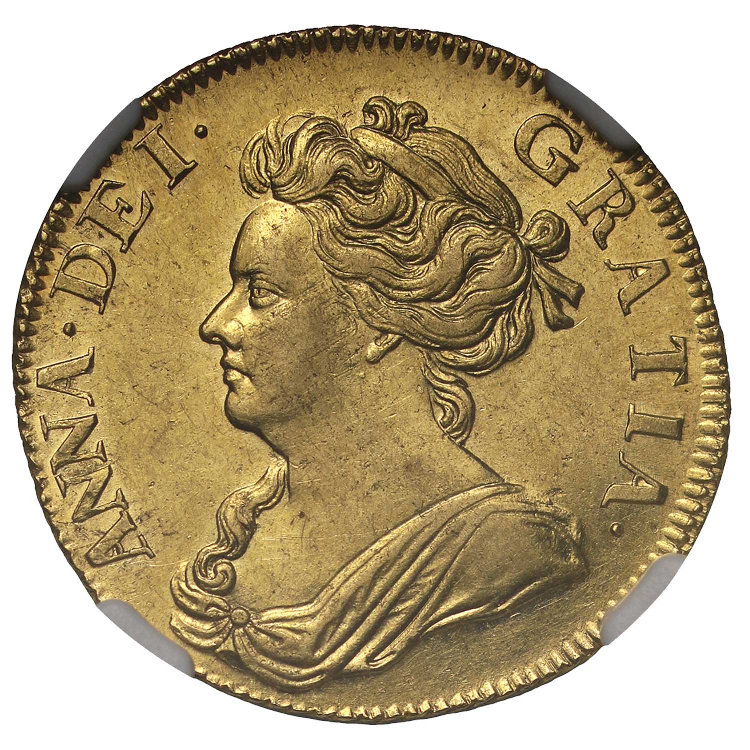 Image of a gold coin with a woman’s profile